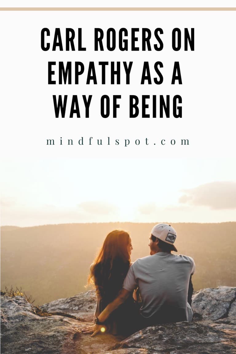 A couple watching a sunset with text overlay: Carl Rogers on empathy as a way of being.