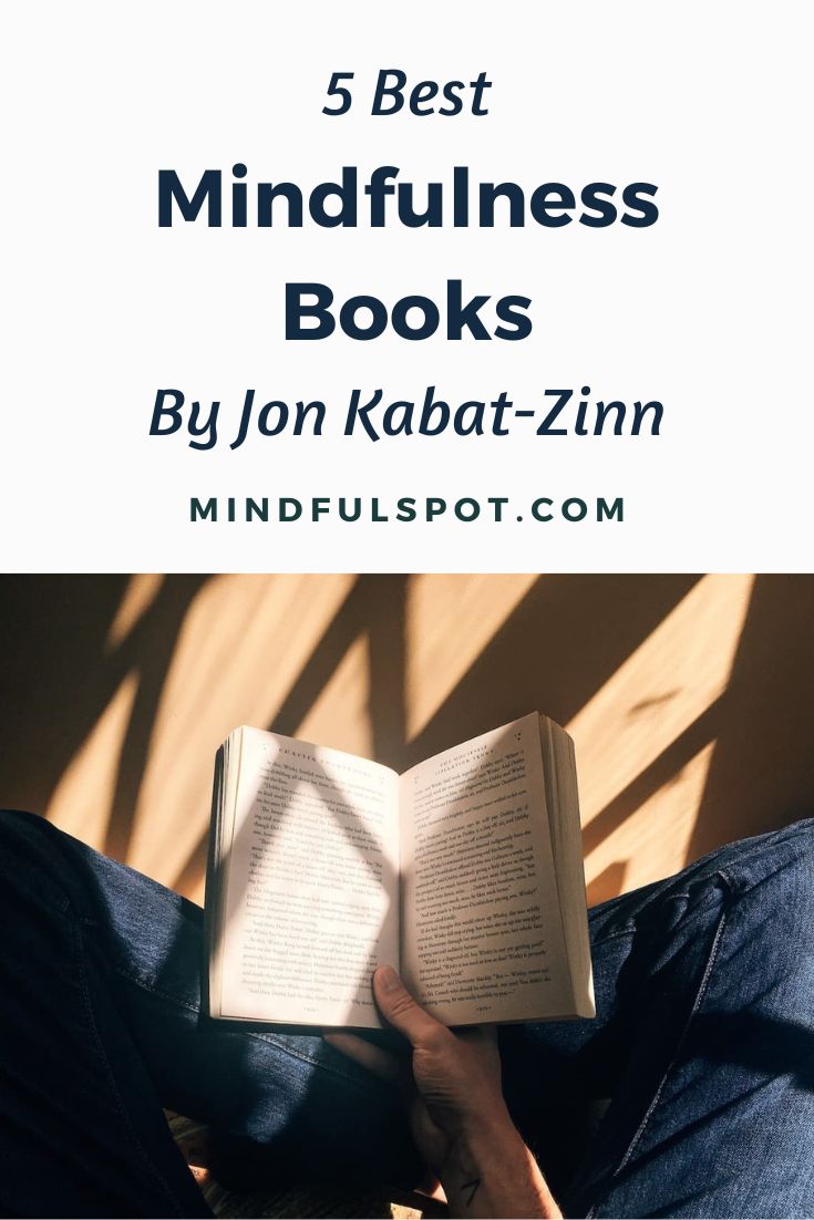 Man reading a book with text overlay: Best Mindfulness Books by Jon Kabat-Zinn.